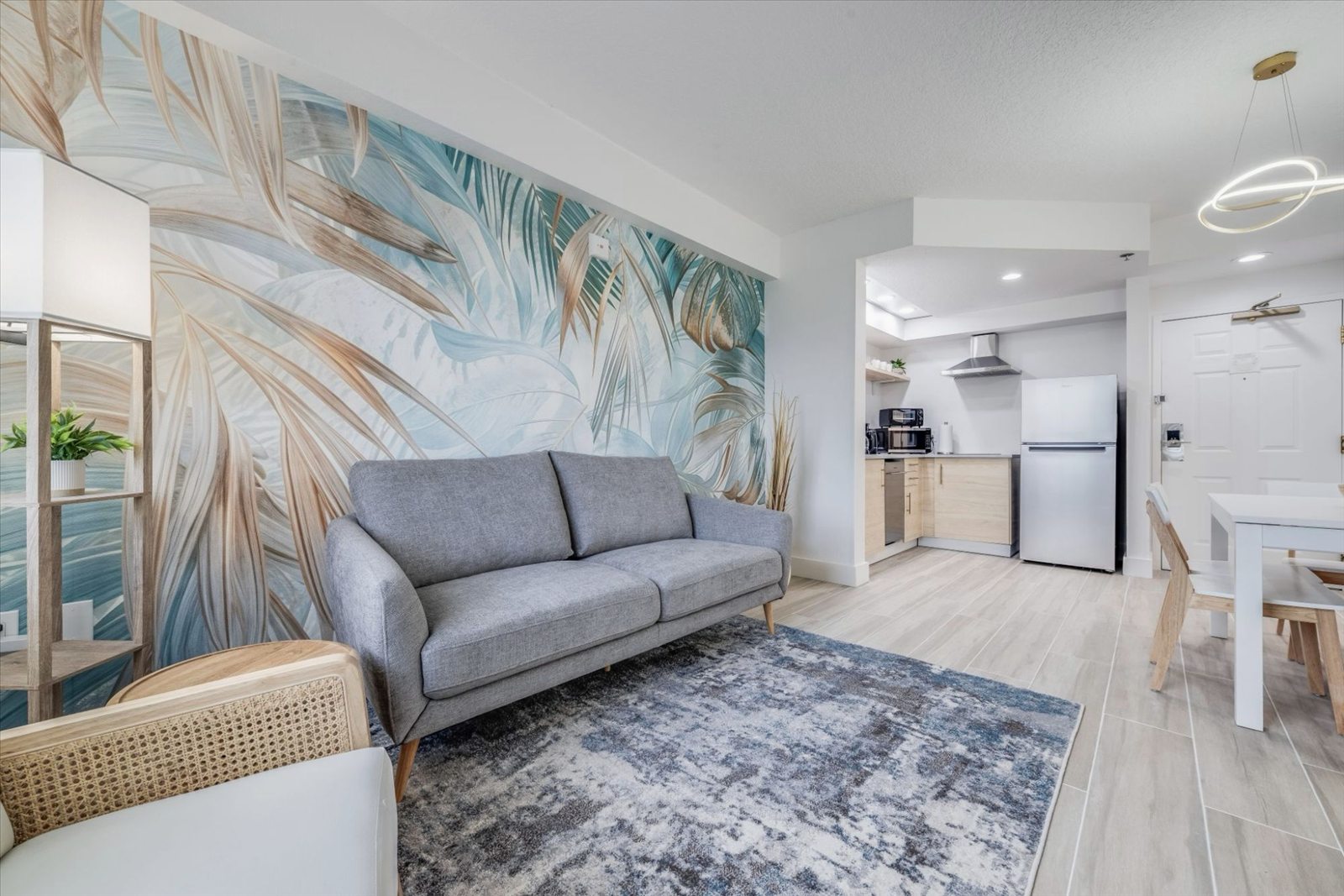 Vacation rental with a view of the pool and palm trees